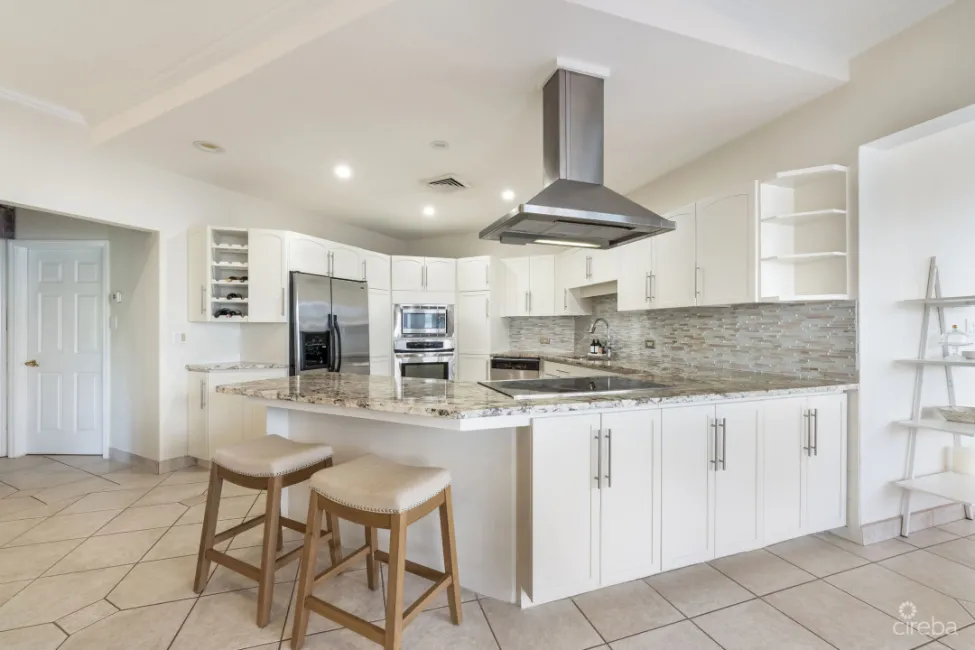 POINSETTIA PENTHOUSE B7, SEVEN MILE CORRIDOR