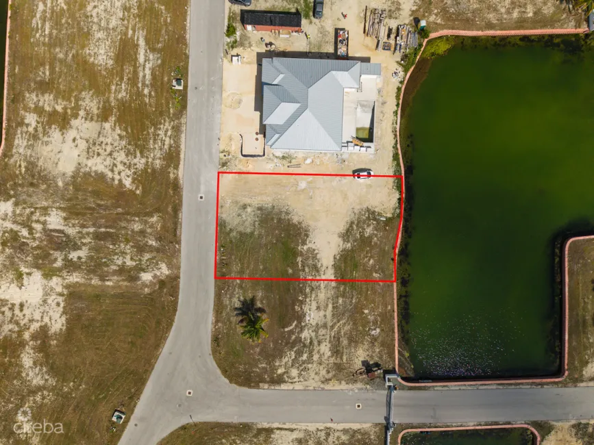 0.24 ACRE CANAL LOT IN GATED COMMUNITY - MUSTIQUE COVE
