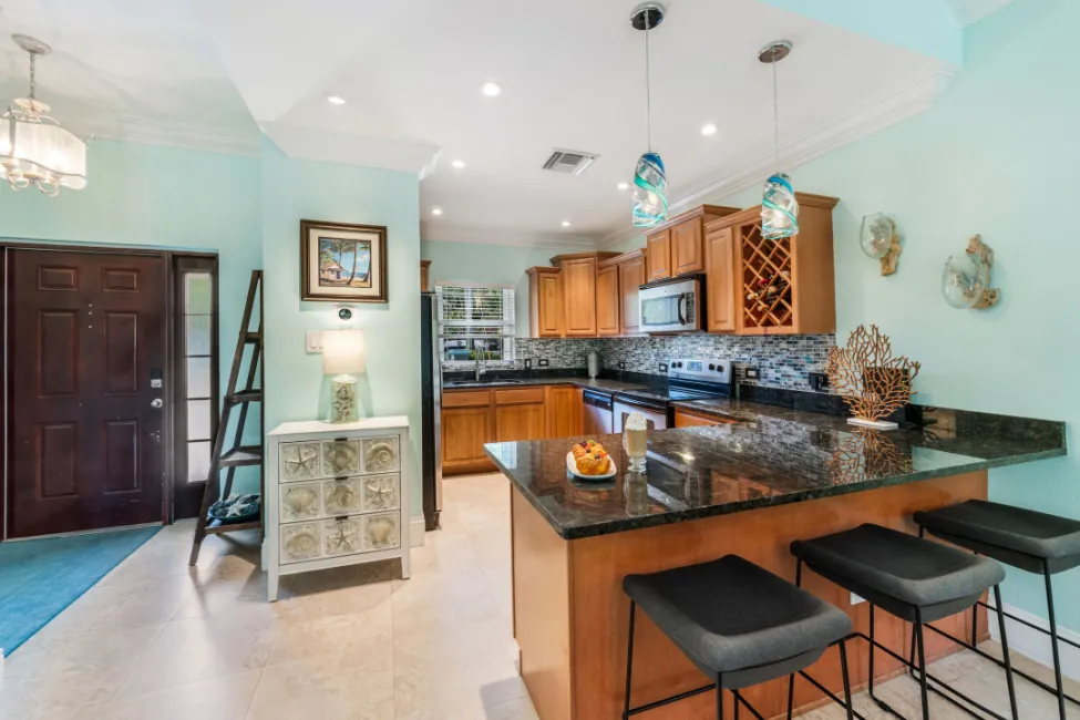 UPGRADED COASTAL ESCAPE CANAL FRONT TOWNHOUSE