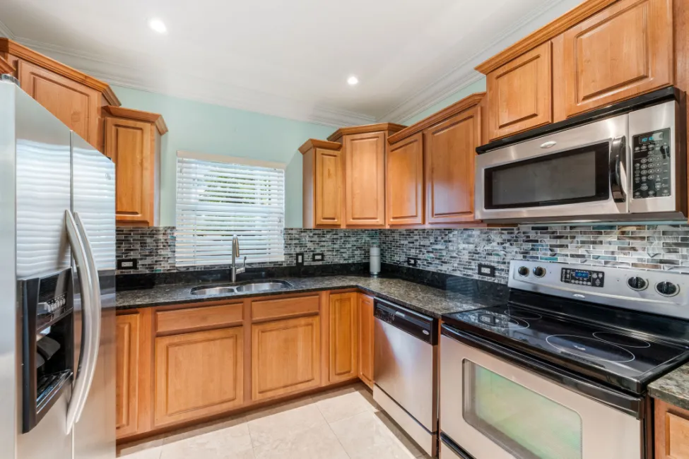 UPGRADED COASTAL ESCAPE CANAL FRONT TOWNHOUSE