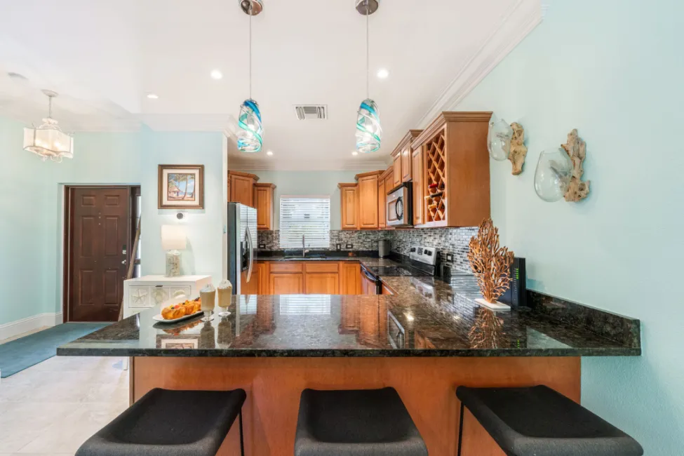 UPGRADED COASTAL ESCAPE CANAL FRONT TOWNHOUSE