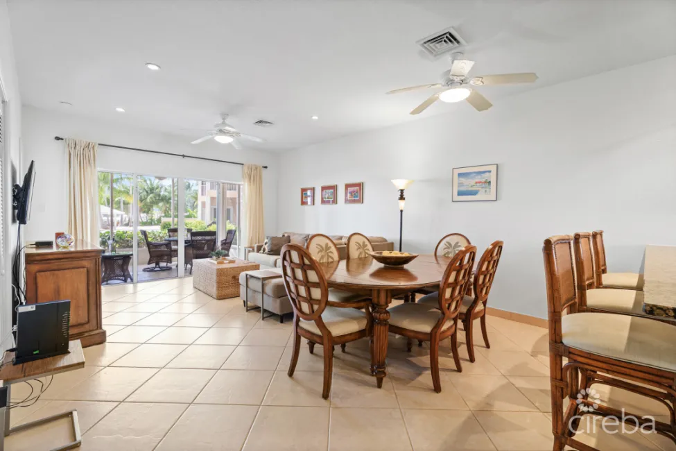 open concept kitchen bar, dining area and living room
